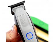 Profesjonalny trymer do w�os�w z wymiennymi akumulatorami Supreme Trimmer Recharge ST777/W - bia�y